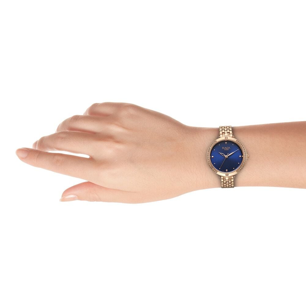 Titan Raga Showstopper Quartz Analog Blue Dial Rose Gold Metal Strap Watch For Women