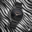 Fastrack Animal Print Quartz Analog with Date Black Dial Stainless Steel Strap Watch for Girls